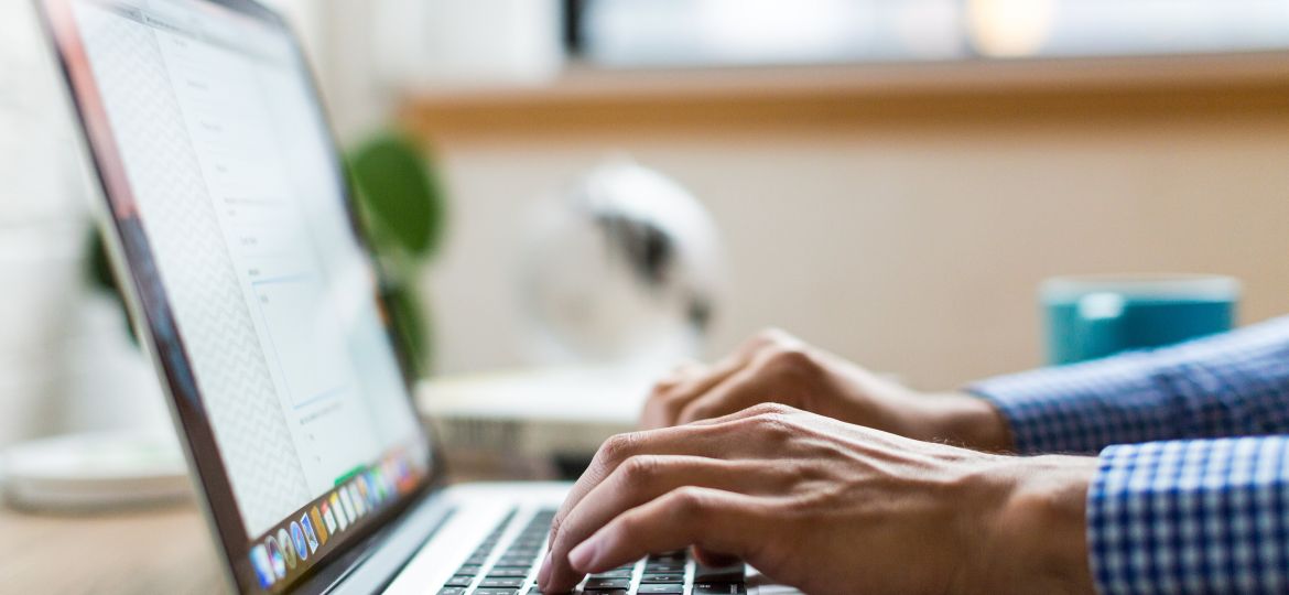 hands-typing-on-laptop